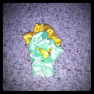 Two green and yellow scrunchies